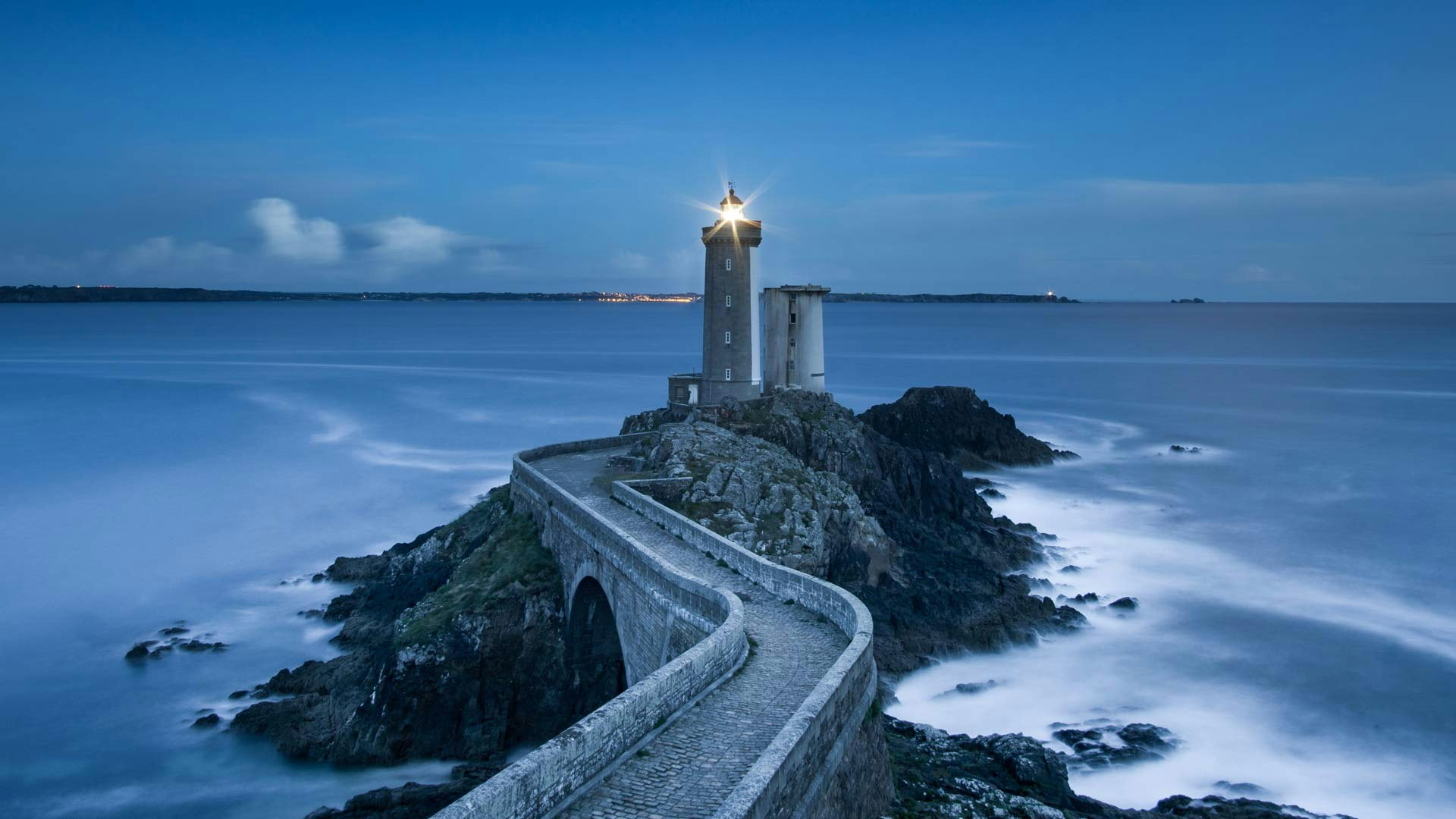 Lighthouse on a Blue Coast